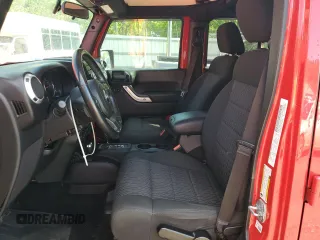 2012 Jeep Wrangler Unlimited Sahara with VIN 1C4BJWEG0CL128417, listed as a Copart auction lot 56243815 with 95,635 mi miles and Salvage title. Bid and sale history available at DreamBid. Image 7.