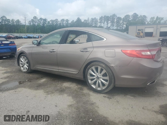2013 Hyundai Azera z VIN KMHFH4JG1DA285969, wystawiony jako Copart lot #51234205 z przebiegiem 64 342 mil mil oraz Czysty tytuł • Clean title. Historia ofert i sprzedaży dostępna na DreamBid. Obrazek 2.