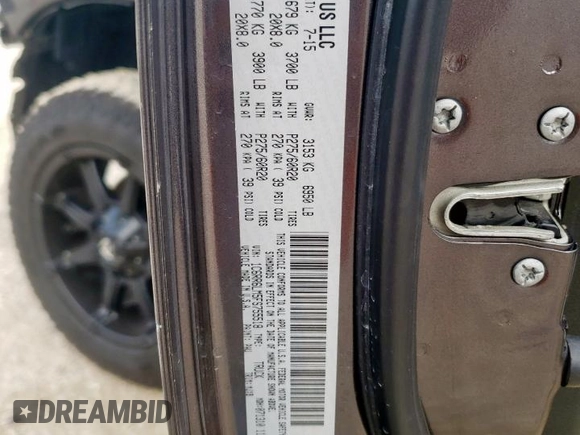 2015 Ram 1500 Big Horn with VIN 1C6RR6LM5FS755518, listed as a Copart auction lot 58826205 with 211,566 mi miles and Salvage title. Bid and sale history available at DreamBid. Image 12.