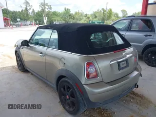2010 MINI Convertible with VIN WMWMR3C52ATU97825, listed as a IAAI auction lot 42349417 with 64,045 mi miles and . Bid and sale history available at DreamBid. Image 3.
