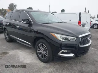 2019 Infiniti QX60 LUXE with VIN 5N1DL0MN7KC500202, listed as a IAAI auction lot 41229623 with 103,626 mi miles. Bid and sale history available at carsss.com. Image 1.