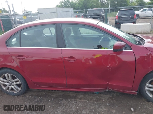 2017 Volkswagen Jetta S z VIN 3VW2B7AJ2HM314001, wystawiony jako IAAI lot #42602453 z przebiegiem 88 464 mil mil oraz . Historia ofert i sprzedaży dostępna na DreamBid. Obrazek 13.