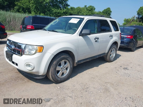 2011 Ford Escape XLT z VIN 1FMCU9DG3BKB69543, wystawiony jako IAAI lot #42763900 z przebiegiem 82 676 mil mil oraz . Historia ofert i sprzedaży dostępna na DreamBid. Obrazek 2.