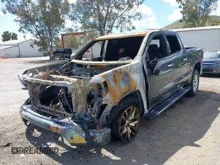 2019 GMC Sierra 1500 SLT z VIN 3GTP8DED1KG229179, wystawiony jako IAAI lot #41932481 z przebiegiem Nie podano mil oraz . Historia ofert i sprzedaży dostępna na DreamBid. Obrazek 2.