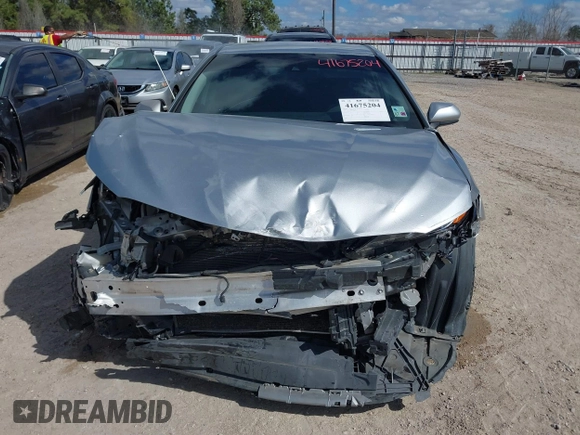 2020 Toyota Camry SE z VIN 4T1G11AK1LU308174, wystawiony jako IAAI lot #41675204 z przebiegiem 120 034 mil mil oraz . Historia ofert i sprzedaży dostępna na DreamBid. Obrazek 13.