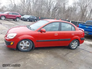 2009 Kia Rio SX with VIN KNADE223796561406, listed as a IAAI auction lot 41650749 with 100,041 mi miles. Bid and sale history available at carsss.com. Image 14.