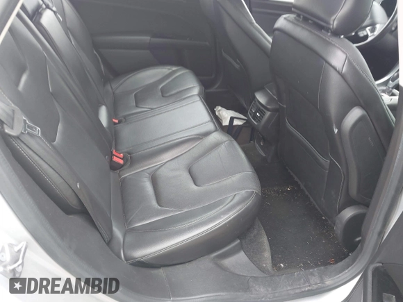 2016 Ford Fusion Titanium with VIN 3FA6P0K93GR117587, listed as a IAAI auction lot 42079701 with 142,105 mi miles. Bid and sale history available at carsss.com. Image 8.