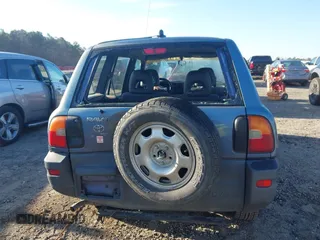 1997 Toyota RAV4 with VIN JT3GP10VXV0015872, listed as a IAAI auction lot 41827830 with 314,640 mi miles and . Bid and sale history available at DreamBid. Image 16.