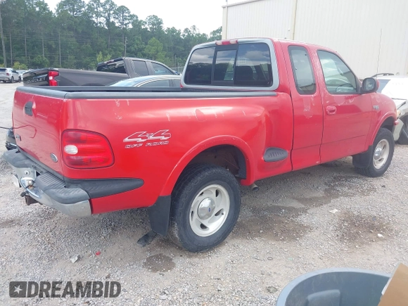1997 Ford F-150 with VIN 1FTDX08W2VKC17809, listed as a IAAI auction lot 42541525 with 143,963 mi miles and . Bid and sale history available at DreamBid. Image 4.
