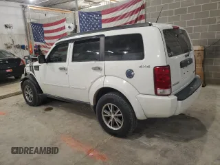 2009 Dodge Nitro SXT with VIN 1D8GU28K19W544135, listed as a Copart auction lot 84706354 with 98,925 mi miles and Salvage Title. Bid and sale history available at carsss.com. Image 2.