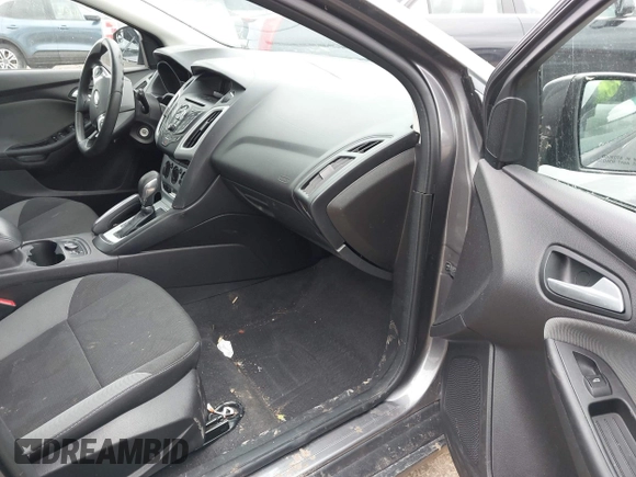 2013 Ford Focus SE with VIN 1FADP3K28DL263859, listed as a IAAI auction lot 41914296 with 103,213 mi miles and . Bid and sale history available at DreamBid. Image 5.