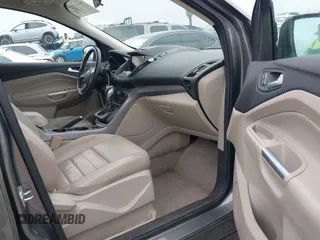 2014 Ford Escape SE with VIN 1FMCU9GX7EUC04296, listed as a IAAI auction lot 42159486 with 108,598 mi miles and . Bid and sale history available at DreamBid. Image 5.