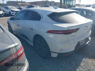 2020 Jaguar I-Pace SE with VIN SADHC2S14L1F85800, listed as a IAAI auction lot 42444115 with 51,249 mi miles and . Bid and sale history available at DreamBid. Image 3.