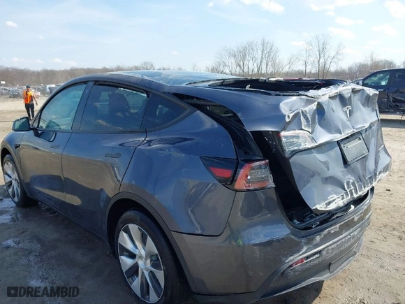 2023 Tesla Model Y Long Range with VIN 7SAYGDEE7PF755980, listed as a IAAI auction lot 41781433 with 31,427 mi miles. Bid and sale history available at carsss.com. Image 3.
