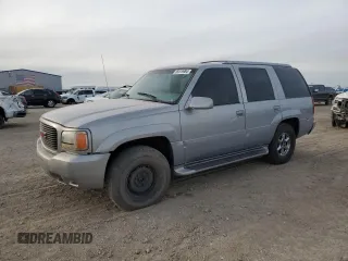 2000 GMC Denali z VIN 1GKEK63R9YR225073, wystawiony jako Copart lot #86819964 z przebiegiem 207 827 mil mil oraz Szkody całkowita. Historia ofert i sprzedaży dostępna na DreamBid. Obrazek 1.