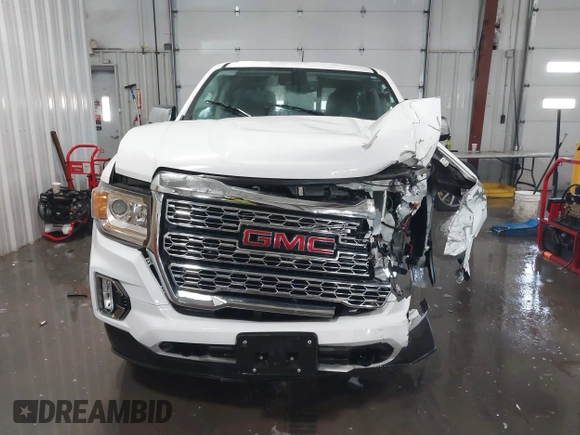 2021 GMC Canyon 4WD Denali with VIN 1GTG6EEN0M1229180, listed as a IAAI auction lot 41298304 with 55,865 mi miles. Bid and sale history available at carsss.com. Image 13.