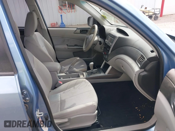 2011 Subaru Forester X with VIN JF2SHBBC8BH777617, listed as a IAAI auction lot 42011038 with 82,059 mi miles and . Bid and sale history available at DreamBid. Image 5.
