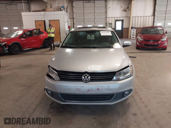 2012 Volkswagen Jetta Sedan SEL w/Sunroof with VIN 3VWLX7AJ4CM344390, listed as a IAAI auction lot 41439880 with 220,093 mi miles. Bid and sale history available at carsss.com. Image 12.