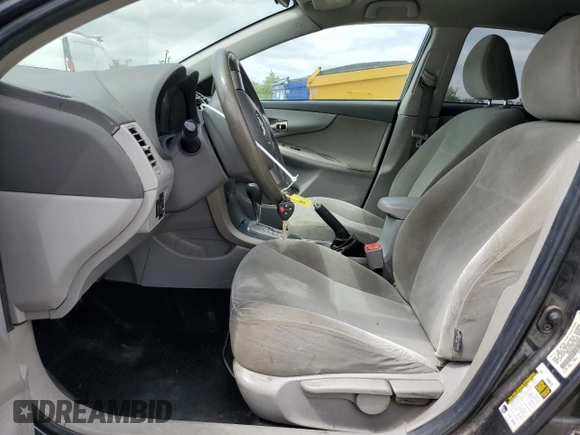 2010 Toyota Corolla with VIN 1NXBU4EE0AZ209169, listed as a Copart auction lot 53502225 with 214,412 mi miles and Salvage title. Bid and sale history available at DreamBid. Image 7.