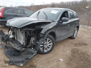 2015 Mazda CX-5 Sport with VIN JM3KE4BY9F0495948, listed as a IAAI auction lot 41501840 with 145,959 mi miles. Bid and sale history available at carsss.com. Image 18.