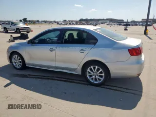 2012 Volkswagen Jetta SE z VIN 3VWDP7AJ0CM420885, wystawiony jako Copart lot #57722645 z przebiegiem 162 136 mil mil oraz Czysty tytuł • Clean title. Historia ofert i sprzedaży dostępna na DreamBid. Obrazek 2.