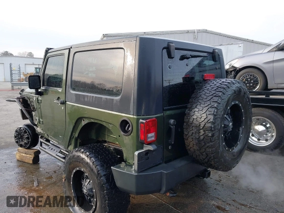 2009 Jeep Wrangler Rubicon z VIN 1J8GA64169L743008, wystawiony jako IAAI lot #41792451 z przebiegiem 142 414 mil mil oraz . Historia ofert i sprzedaży dostępna na DreamBid. Obrazek 3.