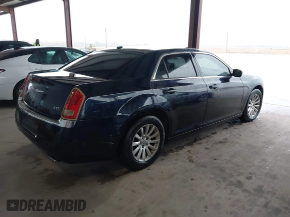 2011 Chrysler 300 with VIN 2C3CA4CGXBH523474, listed as a IAAI auction lot 41673690 with 187,389 mi miles. Bid and sale history available at carsss.com. Image 4.