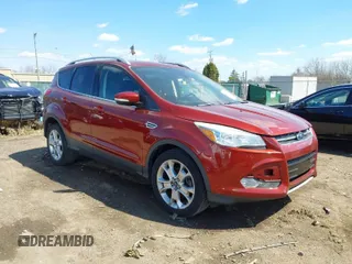 2016 Ford Escape Titanium with VIN 1FMCU0JX6GUC37684, listed as a IAAI auction lot 41829191 with 88,032 mi miles. Bid and sale history available at carsss.com. Image 1.
