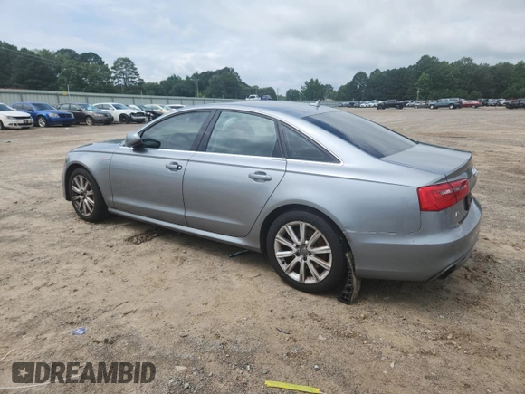 2012 Audi A6 Prestige with VIN WAUJGAFC2CN070787, listed as a Copart auction lot 60617945 with 193,589 mi miles and Salvage title. Bid and sale history available at DreamBid. Image 2.