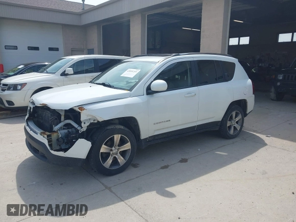 2017 Jeep Compass High Altitude with VIN 1C4NJCEB1HD212246, listed as a IAAI auction lot 42095253 with 123,834 mi miles. Bid and sale history available at carsss.com. Image 17.