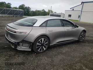 2023 Lucid Air Touring z VIN 50EA1TEA0PA001802, wystawiony jako Copart lot #66840374 z przebiegiem Nie podano mil oraz Szkody całkowita. Historia ofert i sprzedaży dostępna na DreamBid. Obrazek 3.