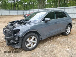 2019 Audi Q3 Premium z VIN WA1AECF32K1075590, wystawiony jako Copart lot #52745635 z przebiegiem 69 256 mil mil oraz Szkoda całkowita • Salvage title. Historia ofert i sprzedaży dostępna na DreamBid. Obrazek 1.