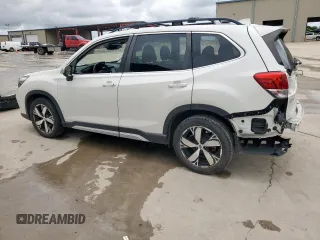 2020 Subaru Forester Touring with VIN JF2SKAXC3LH431111, listed as a Copart auction lot 60539515 with 88,853 mi miles and Salvage title. Bid and sale history available at DreamBid. Image 2.