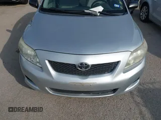 2009 Toyota Corolla with VIN 1NXBU40E19Z027967, listed as a IAAI auction lot 41922518 with 117,115 mi miles. Bid and sale history available at carsss.com. Image 6.