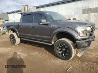 2015 Ford F-150 XLT with VIN 1FTEW1EG4FFA98648, listed as a Copart auction lot 48473785 with 140,069 mi miles and Clean Title. Bid and sale history available at carsss.com. Image 4.