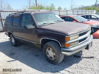 1997 Chevrolet Tahoe with VIN 1GNEK13R5VJ386701, listed as a IAAI auction lot 42046195 with 241,735 mi miles. Bid and sale history available at carsss.com. Image 1.