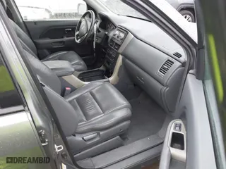 2007 Honda Pilot EX-L with VIN 5FNYF28617B024003, listed as a IAAI auction lot 41479218 with 201,868 mi miles. Bid and sale history available at carsss.com. Image 5.