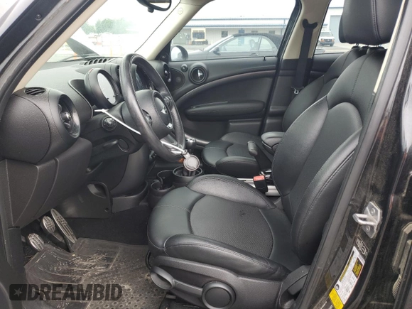 2015 MINI Countryman S with VIN WMWZC3C51FWP52784, listed as a Copart auction lot 58366455 with 78,432 mi miles and Salvage title. Bid and sale history available at DreamBid. Image 7.