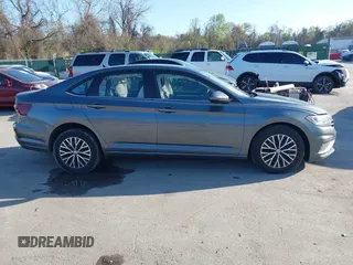 2021 Volkswagen Jetta S z VIN 3VWC57BU7MM050305, wystawiony jako IAAI lot #41937263 z przebiegiem 41 241 mil mil oraz . Historia ofert i sprzedaży dostępna na DreamBid. Obrazek 14.