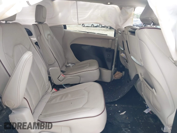 2017 Chrysler Pacifica Limited with VIN 2C4RC1GG9HR560544, listed as a IAAI auction lot 41807810 with 137,768 mi miles and . Bid and sale history available at DreamBid. Image 8.
