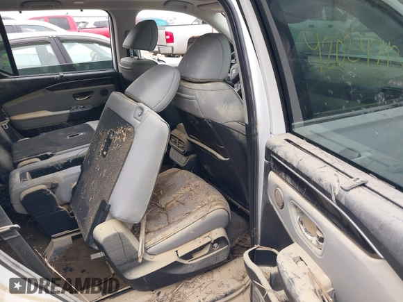 2023 Honda Pilot Elite with VIN 5FNYG1H80PB020937, listed as a IAAI auction lot 42024743 with 20,740 mi miles and . Bid and sale history available at DreamBid. Image 8.