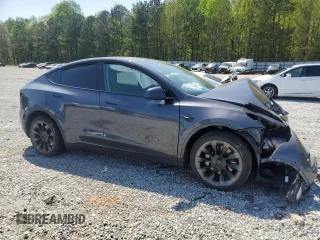 2022 Tesla Model Y Long Range z VIN 7SAYGDEE9NA014319, wystawiony jako Copart lot #53003555 z przebiegiem Nie podano mil oraz Szkody całkowita. Historia ofert i sprzedaży dostępna na DreamBid. Obrazek 4.