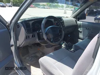 2000 Nissan Frontier XE with VIN 1N6DD26S4YC316857, listed as a IAAI auction lot 42066602 with 161,908 mi miles and . Bid and sale history available at DreamBid. Image 5.