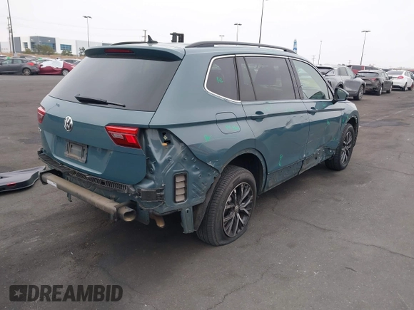 2019 Volkswagen Tiguan SE with VIN 3VV3B7AX3KM113955, listed as a IAAI auction lot 42164890 with 77,806 mi miles and . Bid and sale history available at DreamBid. Image 4.