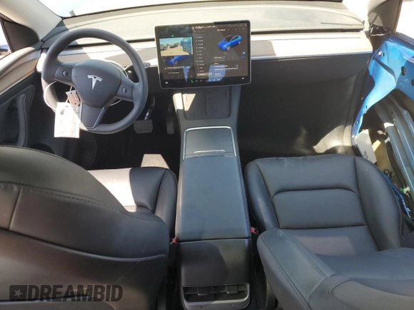 2024 Tesla Model Y Long Range z VIN 7SAYGAEE3RF034699, wystawiony jako Copart lot #54523815 z przebiegiem 9 764 mil mil oraz Szkoda całkowita • Salvage title. Historia ofert i sprzedaży dostępna na DreamBid. Obrazek 8.