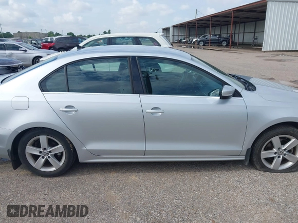 2013 Volkswagen Jetta TDI w/Premium/Nav с VIN 3VWLL7AJ9DM203506, выставлен на аукционе IAAI как лот 42682513 с пробегом 137 614 миль миль и . История ставок и продаж доступна на DreamBid. Изображение 13.