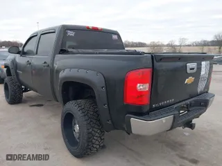 2012 Chevrolet Silverado 1500 LT with VIN 1GCPKSE72CF196471, listed as a IAAI auction lot 41294801 with 155,000 mi miles. Bid and sale history available at carsss.com. Image 3.