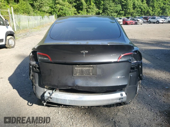 2024 Tesla Model Y Long Range with VIN 7SAYGDEE4RA299503, listed as a Copart auction lot 61950585 with 17,077 mi miles and Salvage title. Bid and sale history available at DreamBid. Image 6.