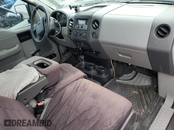 2006 Ford F-150 STX with VIN 1FTRX14W06NA26827, listed as a Copart auction lot 54940365 with 171,077 mi miles and Salvage title. Bid and sale history available at DreamBid. Image 8.