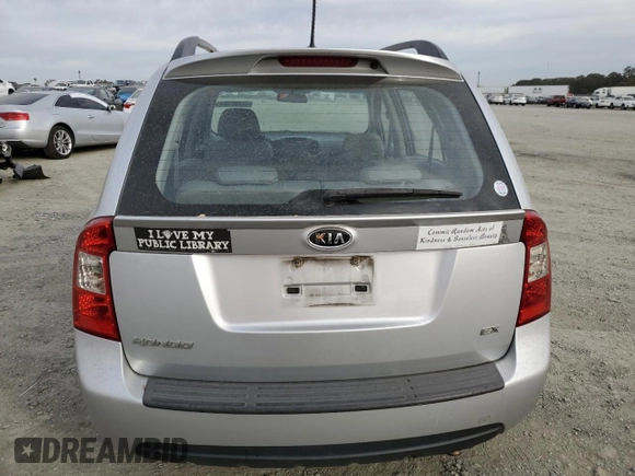 2009 Kia Rondo LX Base with VIN KNAFG528097222268, listed as a Copart auction lot 77797124 with 184,569 mi miles and Salvage Title. Bid and sale history available at carsss.com. Image 6.